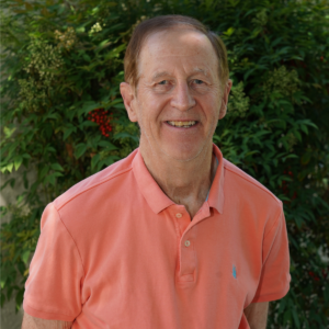 Dr Ray Headshot against greenery